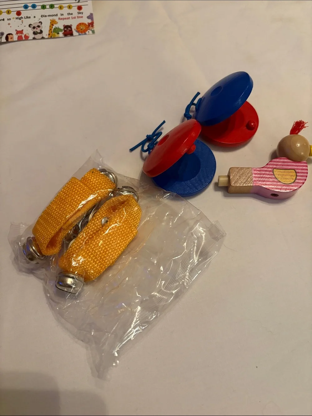 Multicolor Kids Wooden Musical Instrument Set with backpack.